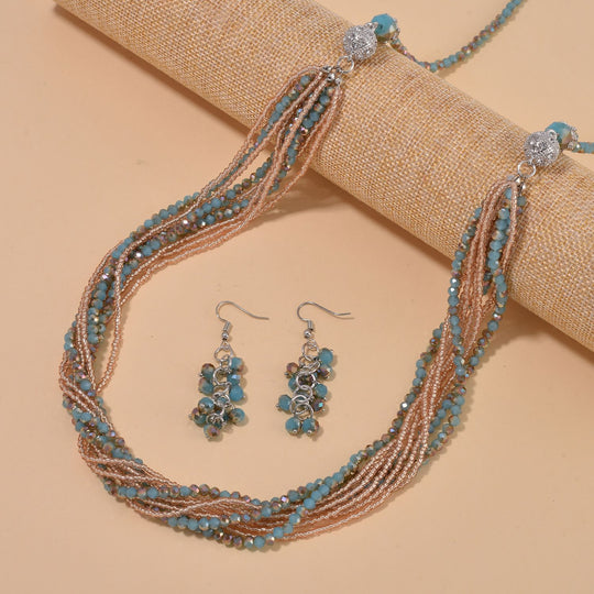 2er Set mehrschichtiger Halsketten und Ohrringe, Blaue, braune und champagnerfarbene Kristallperlen und weiße Kristalle