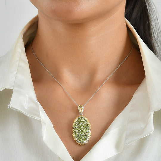 D'Joy Peridot Arizona und Zirkon Ring, 925 Silber rhodiniert und 750 Gelbgold Vermeil - 5,60 ct.