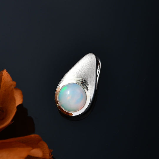 Natürlicher, äthiopischer Welo Opal Anhänger 925 Silber platiniert ca. 0.59 ct