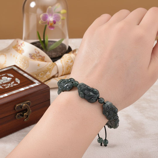Olmek Jadeit Armband Flexibles (15.25- 23 cm) ca. 85,00 ct.
