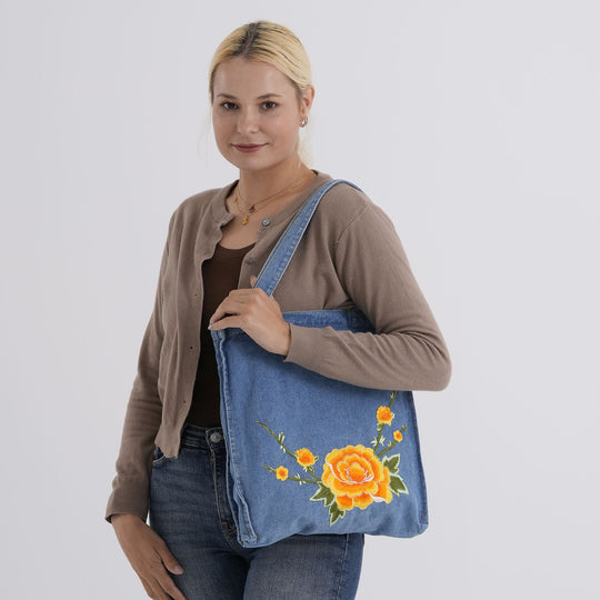 "Profile: Tote bag Life style Color:blue with yellow rose embroidery wall(exterior):Polyester+Cotton Lining(interior): Polyester+Cotton Pockets(exterior):zipped-1 Pockets(interior):Pocket-1 SIZE:33*35*5cm"