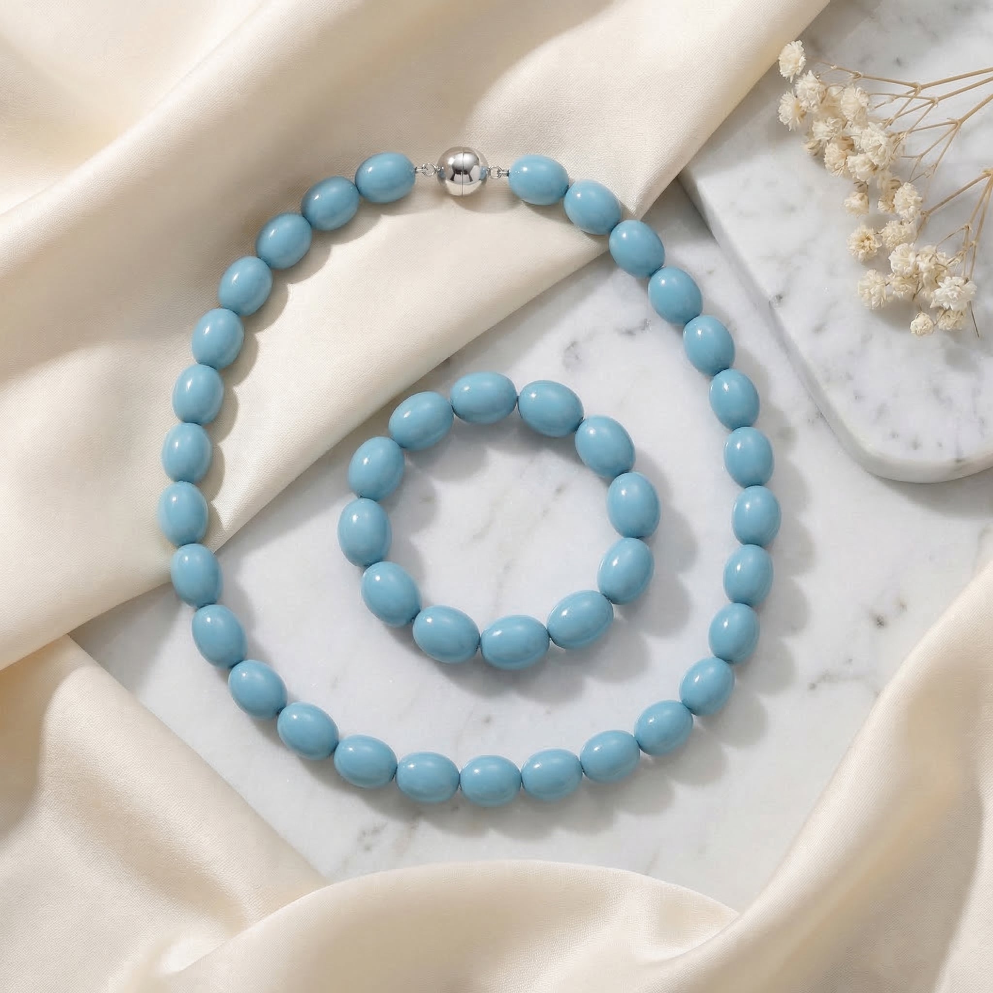 Sleeping Beauty türkisfarbene Oval Muschelkernperle 50cm Halskette und flexibles Armband