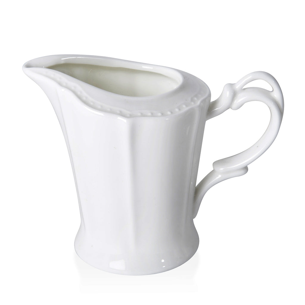 22 teiliges Porzellan geprägtes Tee-Set, 6 Tassen, 6 Teller, 7 Löffel, 1 Teekanne, 1 Zucker, 1 Milch