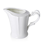 22 teiliges Porzellan geprägtes Tee-Set, 6 Tassen, 6 Teller, 7 Löffel, 1 Teekanne, 1 Zucker, 1 Milch