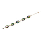 Grünes Glaskristall Armband und Ohringe, goldfarben