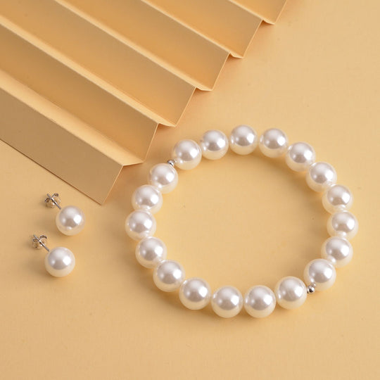 Goldenes Muschelkernperlen-Armband und Ohrringe, 925 Silber rhodiniert