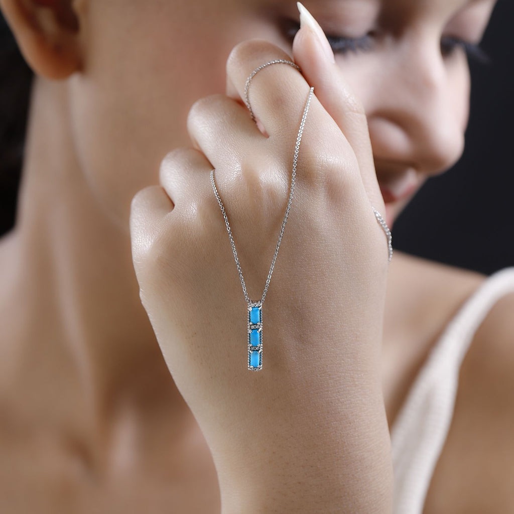 Amerikanische, natürliche Sleeping Beauty Türkis, weißer Zirkon Anhänger mit Kette, 925 Silber platiniert ca. 0.79 ct