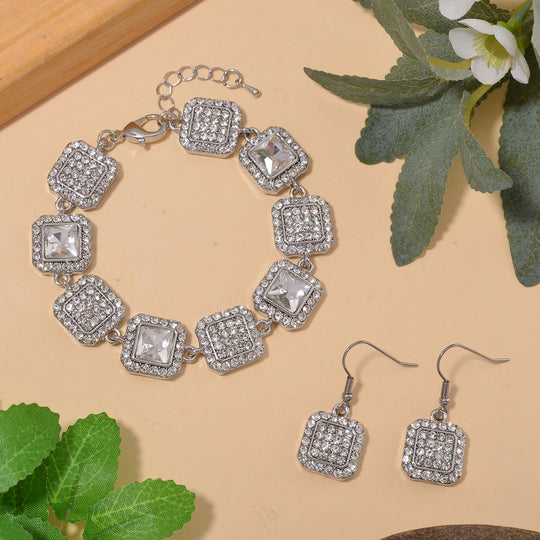 2er Set - Weißer Kristall Armband und Ohrringe, goldfarben