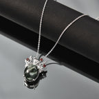 Viktorianische Blüte - Sibirischer Seraphinite, Roter Granat Anhänger mit Kette ca. 50 cm, 925 Silber platiniert ca. 5.08 ct