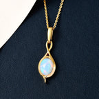 Natürlicher, äthiopischer Welo Opal Anhänger mit Kette, 925 Silber vergoldet ca. 0.85 ct