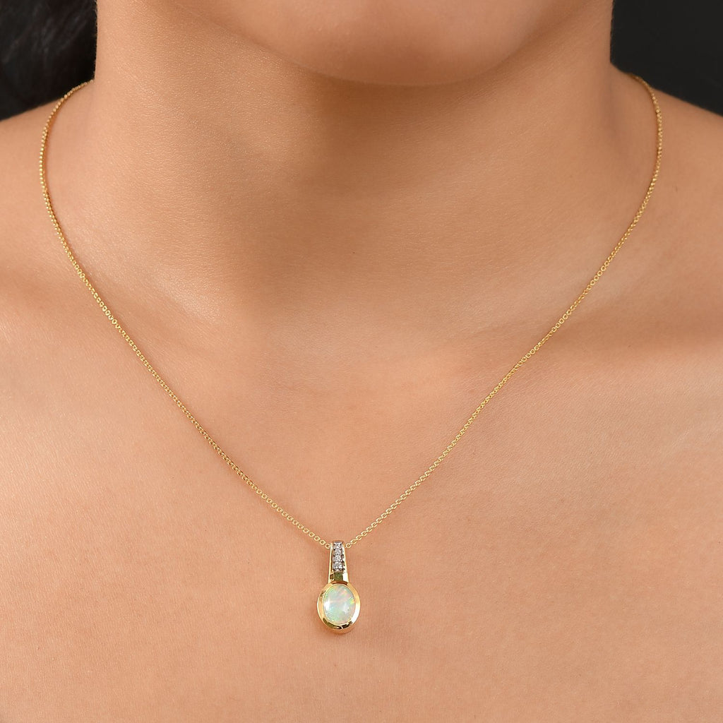 D joy Natürlicher, äthiopischer Welo Opal, Smaragd Anhänger mit Kette, 925 Silber 750 Gelbgold Vermeil ca. 1.32 ct