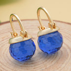 Blaue Kristall-Ohrringe, reines Messing