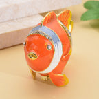Tablettendöschen mit weißen Kristallen, emailliert, Fisch, Orange