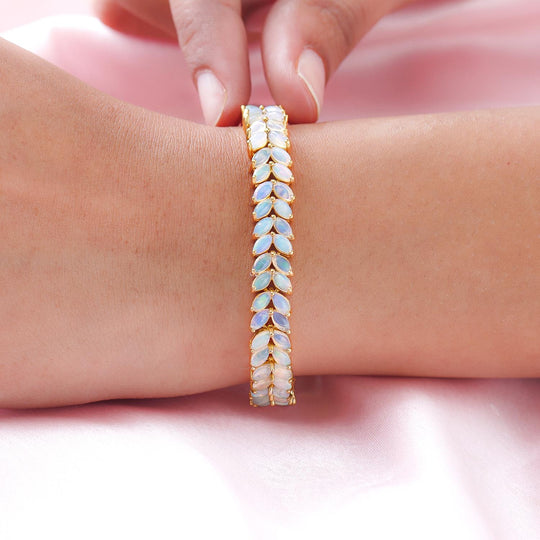 Natürliches, äthiopisches Welo Opal Armband, ca. 20 cm, 925 Silber vergoldet ca. 10.60 ct