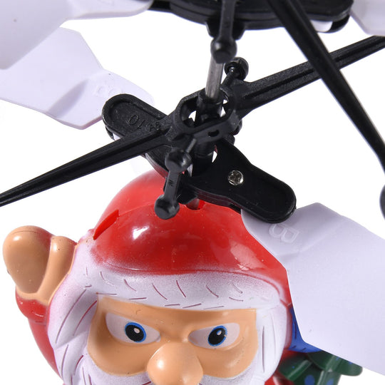 Fliegender Weihnachtsmann mit Sensor zum interaktiven Spiel, 6.3x2x7cm, Rot