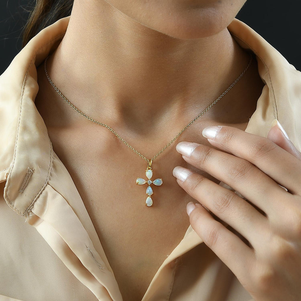 Natürlicher, äthiopischer Welo Opal und weißer Zirkon Kreuz-Anhänger, 925 Silber vergoldet ca. 1.41 ct