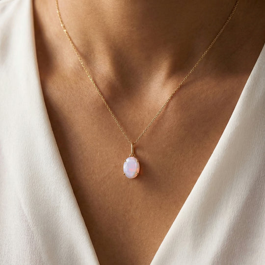 AA Natürlicher, äthiopischer Welo Opal Anhänger 375 Gold ca. 0.79 ct