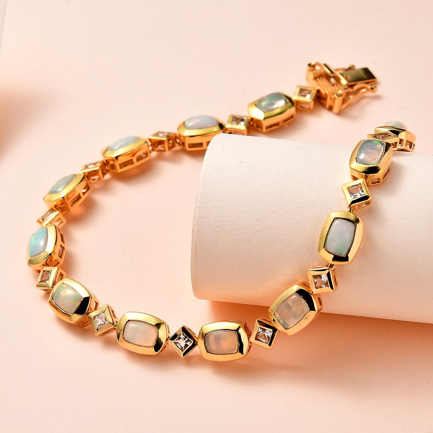 AA Natürlicher, äthiopischer Welo Opal, Weißer Topas Armband ca. 20 cm 925 Silber vergoldet ca. 5.79 ct