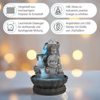 Buddha mit Glaskugel und Licht
