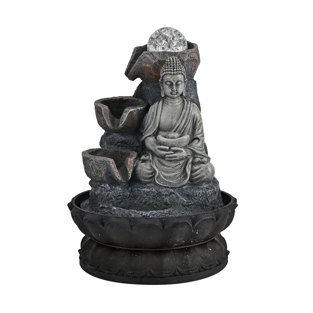 Buddha mit Glaskugel und Licht