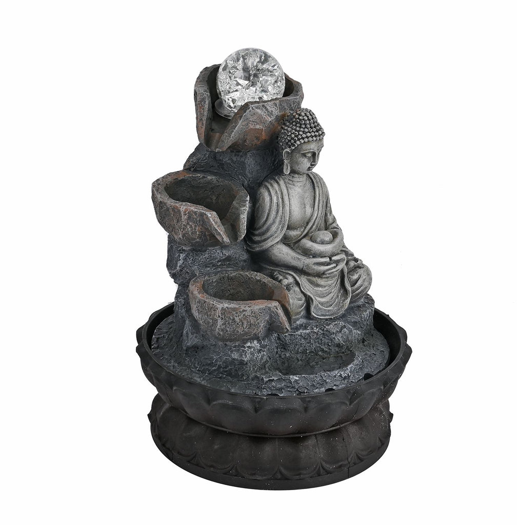 Buddha mit Glaskugel und Licht