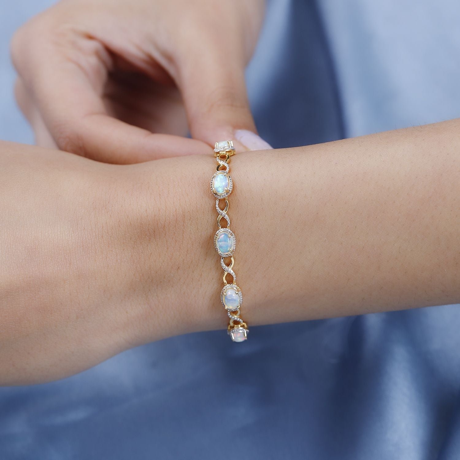 AA Natürlicher, äthiopischer Welo Opal Armband ca. 18 cm 925 Silber Gelbgold Vermeil ca. 1,68 ct.