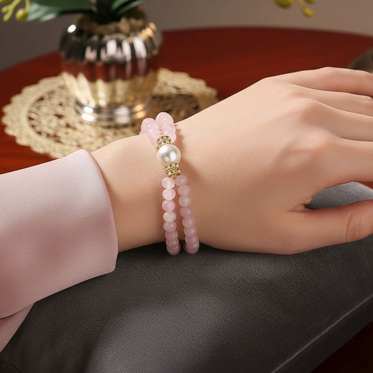 Weiße Muschelkernperle (9-11 mm) Armband mit Roter Quarzit, flexibel (18-19 cm), Goldfarben