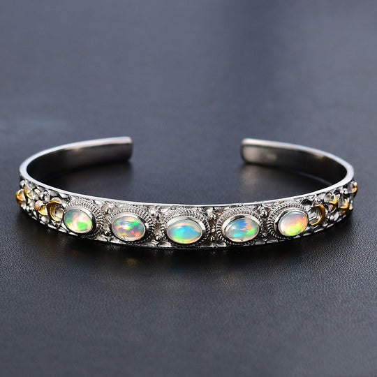 AA Natürlicher, äthiopischer Welo Opal Armreif ca. 19 cm 925 Silber rhodiniert ca. 2.74 ct