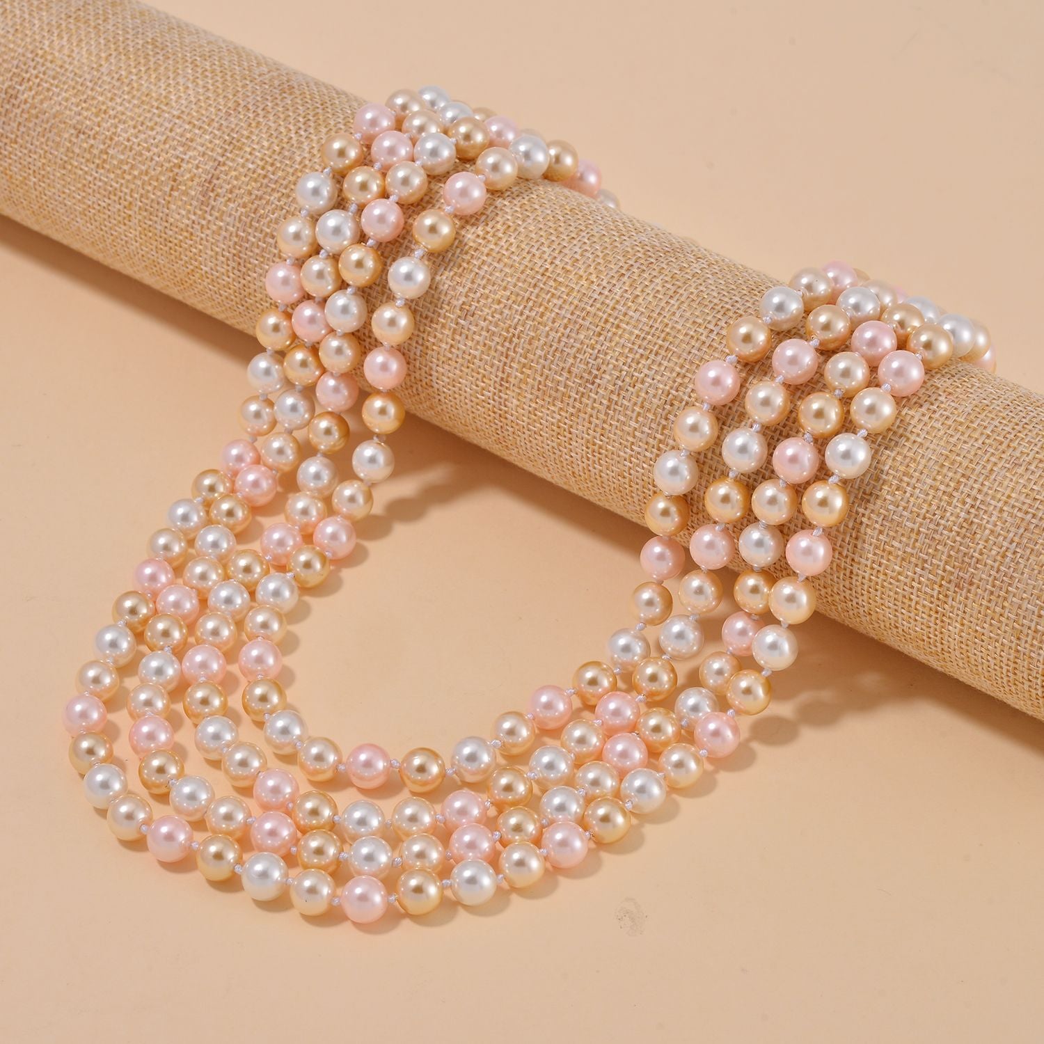 Mehrreihige Muschelkernperle in Gold, Rosa und weiß, 255 cm