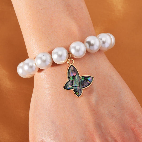 Sleeping Beauty türkisfarbenes Muschelkernperle und Abalone Muschel flexibles Armband, Legierung vergoldet