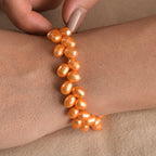 Süßwasserperlen-Armband, orange gefärbt, Tropfenform, ca. 19 cm, Edelstahl