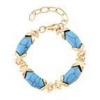 Blauer Howlit Armband, ca. 15.25 cm + 5 cm Extender, gelb vergoldet ca. 65.00 ct