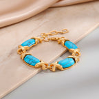 Blauer Howlit Armband, ca. 15.25 cm + 5 cm Extender, gelb vergoldet ca. 65.00 ct