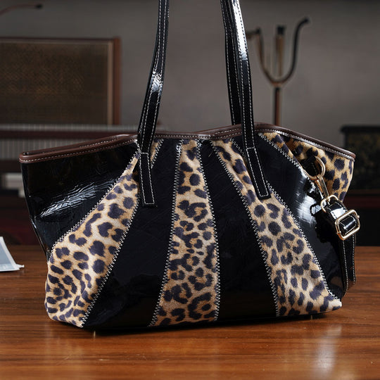Chaos by Elsie Echtleder Shopper mit RFID, Leopard Patchwork mit Hochglanz Optik, Strahlen Paneel Design, 33 x 13 x 24 cm, Schwarz Braun