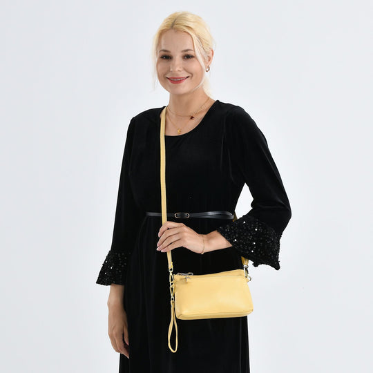 Leder Crossbody Tasche mit mehreren Reißverschlussfächern und verstellbarem Schulterriemen 21.5 x 4 x 13 cm Gelb