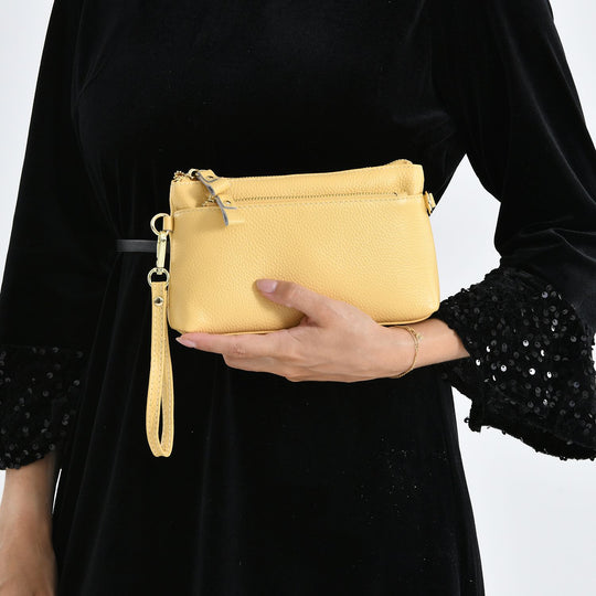 Leder Crossbody Tasche mit mehreren Reißverschlussfächern und verstellbarem Schulterriemen 21.5 x 4 x 13 cm Gelb