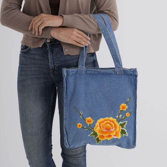 "Profile: Tote bag Life style Color:blue with yellow rose embroidery wall(exterior):Polyester+Cotton Lining(interior): Polyester+Cotton Pockets(exterior):zipped-1 Pockets(interior):Pocket-1 SIZE:33*35*5cm"