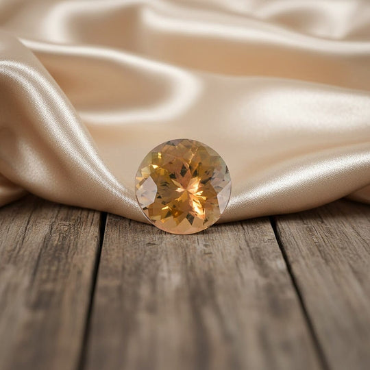 AAAA Natural Golden Tanzanite Round 6.5 Faceted Cut, ca. 1.20 ct