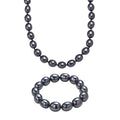 Pfaufarbene Oval Muschelkernperle 50cm Halskette und flexibles Armband