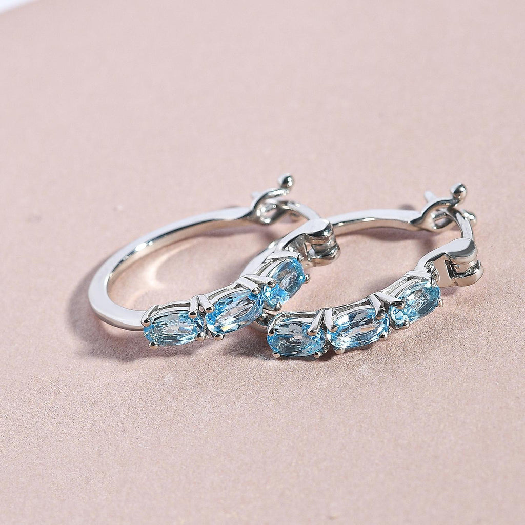 Schweizer Blautopas-Creolen, 925 Silber platiniert ca. 1,61 ct