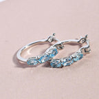 Schweizer Blautopas-Creolen, 925 Silber platiniert ca. 1,61 ct