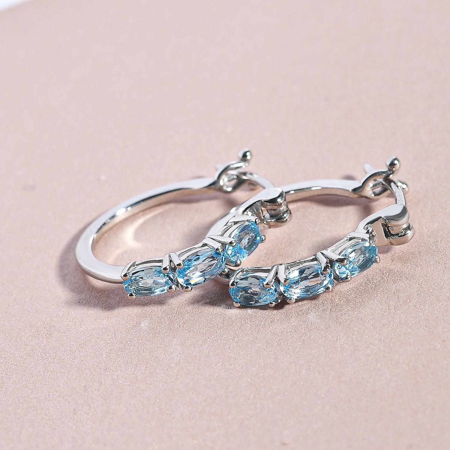 Schweizer Blautopas-Creolen, 925 Silber platiniert ca. 1,61 ct